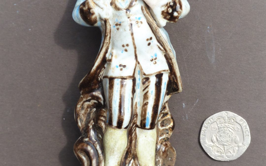 Figurine of man with dove